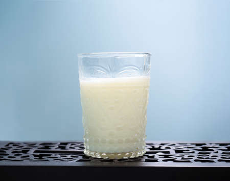 some white milk on clear glass ready to drink