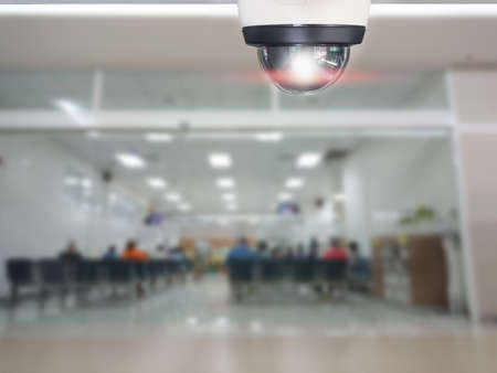 Security CCTV camera installed indoor. Intelligent cameras can record video all day and night to...