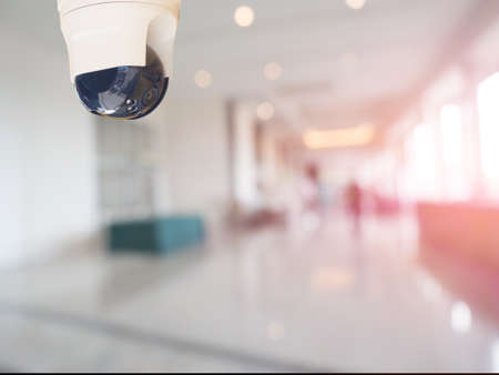 security camera surveillance installed on ceiling to monitor for privacy and protectionの写真素材