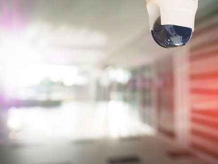 security camera surveillance installed on ceiling to monitor for privacy and protection