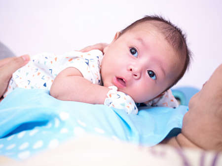 cute baby newborn in lovely action, motherhood concept