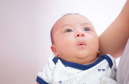cute baby newborn in lovely action, motherhood concept