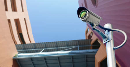 Security CCTV camera installed indoor. Intelligent cameras can record video all day and night to...