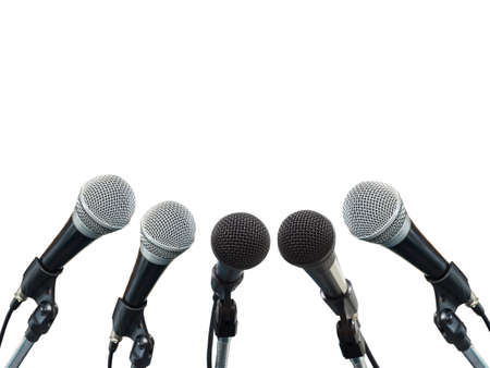 black metallic microphone on white background on stageの写真素材