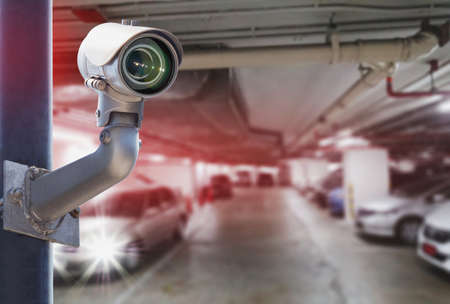 Security CCTV camera installed indoor. Intelligent cameras can record video all day and night to...