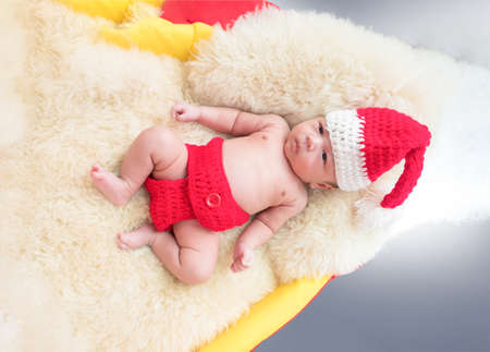 cute baby newborn in lovely action, motherhood concept