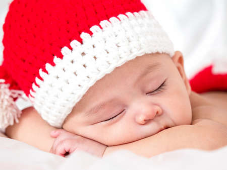 cute newborn three-month baby in lovely action, motherhood conceptの写真素材