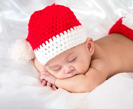 cute newborn three-month baby in lovely action, motherhood conceptの写真素材