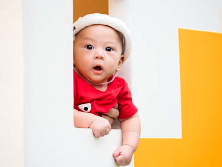 three-month cute baby newborn in lovely action, motherhood conceptの写真素材