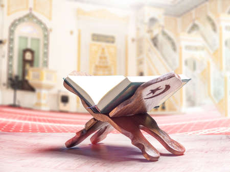 Quran or Kuran ( the islamic holy book) on black background with rosary bead ready to read in ramadan night, muslim style and ramadan conceptの写真素材