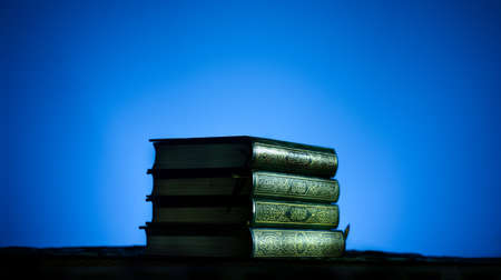 still life of "Quran" or Kuran (the holy book of all muslim), ready to be read in ramadan nightの写真素材