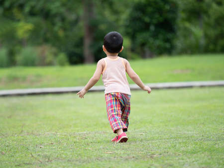 Close up shot of cute asian child in playing activity, health care and motherhood concept.の写真素材