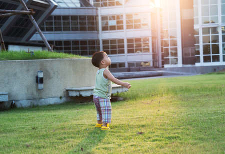 Close up shot of cute asian child in playing activity, health care and motherhood concept.