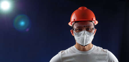 man worker wearing full protection equipments to work duty in the risk atmosphere such as hazard chemical gas or smoke or dust or pm2.5の写真素材