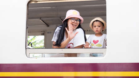 close up shot on happy Asian child  laughing on something in travel trip.の写真素材