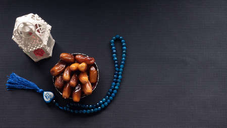 "dates" traditional muslim culture food for ramadan kareem night, prayer for "Allah"(print on heart shape) by fasting food and consumed after sunset during Holy month of Ramadanの写真素材