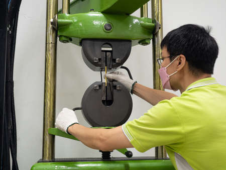 tensile strength test for physical property of metal and plastic material . the engineering equipment for estimating mechanical strenght.の写真素材