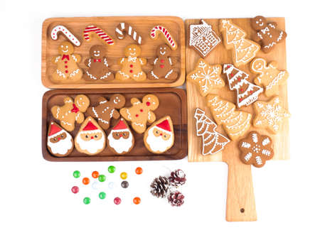 Christmas homemade gingerbread cookies on the white background for decoration and celebration