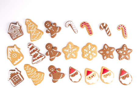 Christmas homemade gingerbread cookies on the white background for decoration and celebration