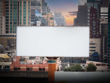 afternoon scene of blank advertising big bilboard installed outdoor on the city backgroundの写真素材