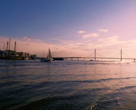 Beautiful sunset on a city beachの写真素材