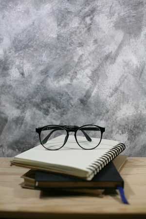 Glasses read with notebookの素材