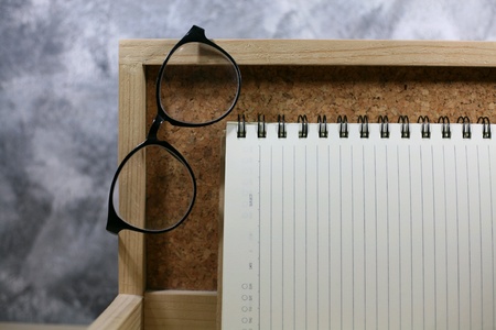 Glasses read with notebookの素材