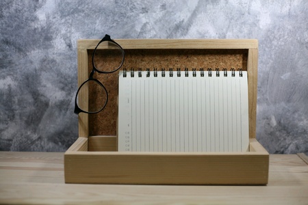 Glasses read with notebook