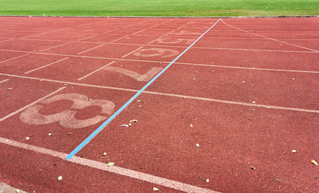 running tracks in athletic stadium.