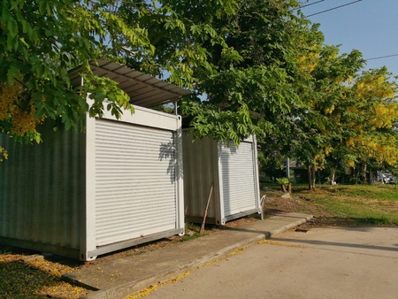 White container in the gardenの写真素材