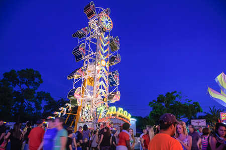 Zipper Swing Ride on the blue sky backgroundのeditorial素材