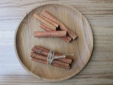top view cinnamon stick in plateの写真素材