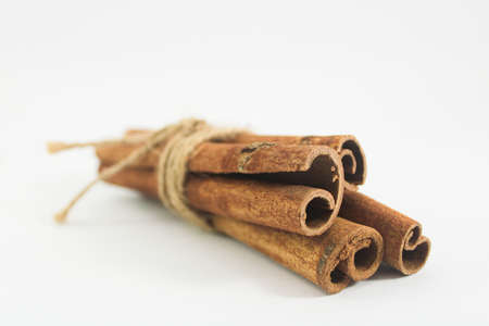 Cinnamon stick in white backgroundの写真素材