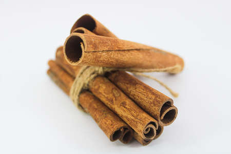 Cinnamon stick in white backgroundの写真素材