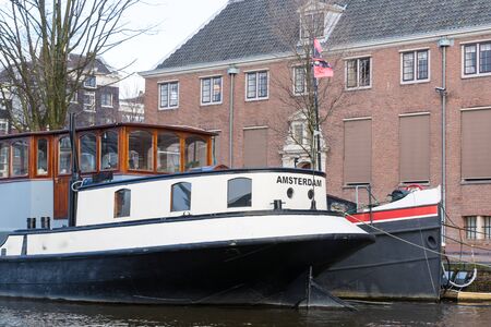 Amsterdam, Netherlands - November 28, 2019: Big white boat called Amsterdam.のeditorial素材