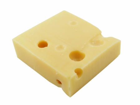 A block of cheese on a white backgroundの写真素材