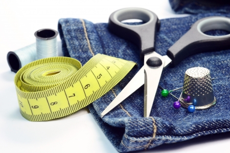Denim jeans with dressmaking sewing utensils needlework conceptの写真素材