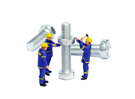 Teamwork concept with construction workers on a big jobの写真素材