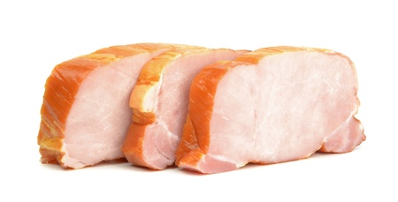 Sliced gammon steaks in a row on a white backgroundの写真素材