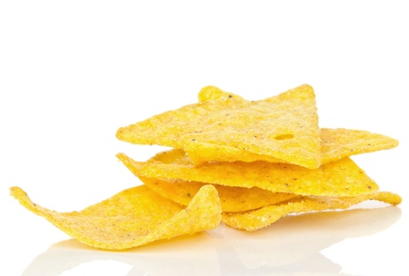 A small pile of tortilla chips on a white backgroundの写真素材