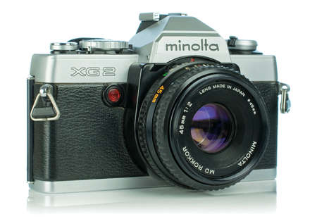NIEDERSACHSEN, GERMANY April 9, 2019: A Minolta XG2 35mm analog film camera on a white backgroundのeditorial素材