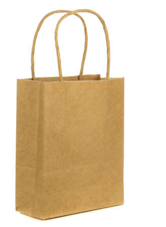 A recyclable brown paper shopping bag isolated on a white background with copy space for your textの写真素材