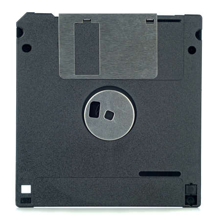 A 3.5 inch computer floppy disc viewed from the back on a white backgroundの写真素材
