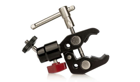 A camera stand clamp grip with a mini ball head joint on a white backgroundの写真素材