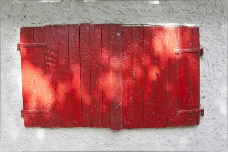 red window in the countrysideの写真素材