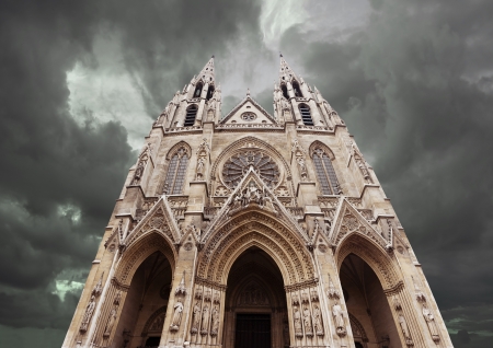 saint clotilde church isolated against cloudy skyの写真素材