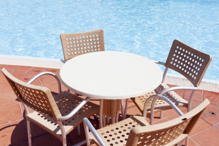 table near the swimming poolの写真素材