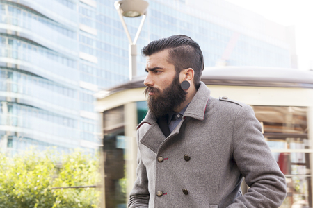portrait of young hipsters businessman around a modern cityの写真素材