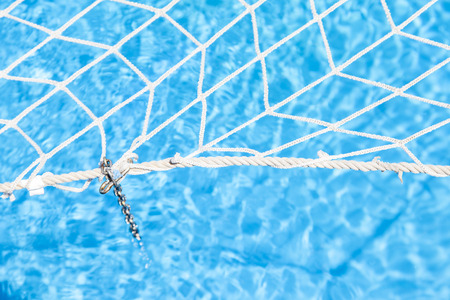 small pool of a cruise ship covered by a protective netの写真素材
