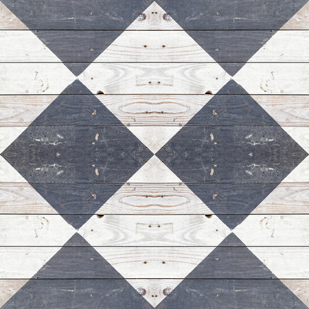 Texture of scratched painted black and white wooden floor rhombus styled
